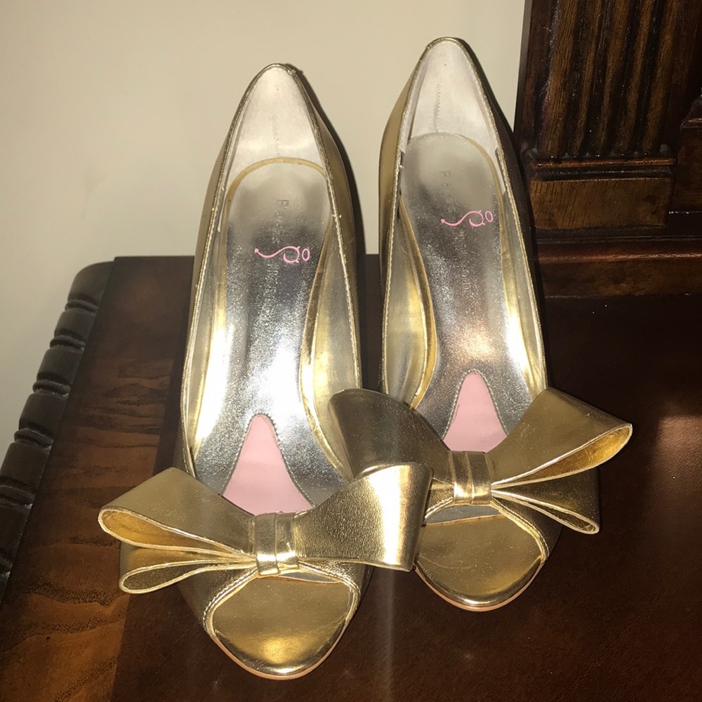 Paris Hilton gold bow heels